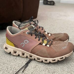 On running earth tone athletic shoes